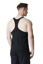 Load image into Gallery viewer, Man facing backward wearing black muscle fit stringer vest of the brand True Form UK
