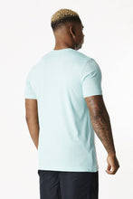 Load image into Gallery viewer, a man facing backward wearing unisex tshirt of mint collectiton true form uk
