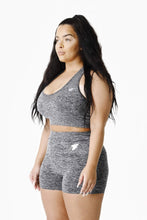 Load image into Gallery viewer, A woman wearing True form Charcoal Sports Bra 
