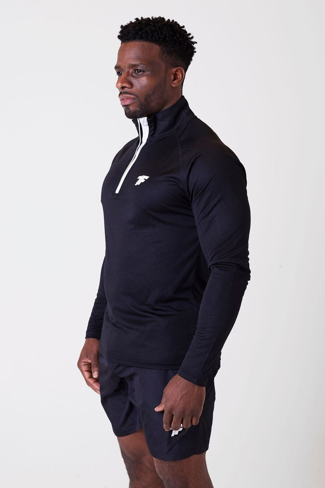 Mens gym full sleeve black quarter zip tshirt of the brand true form uk
